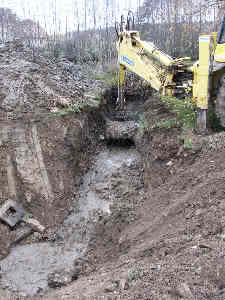 JCB digging drainage trench